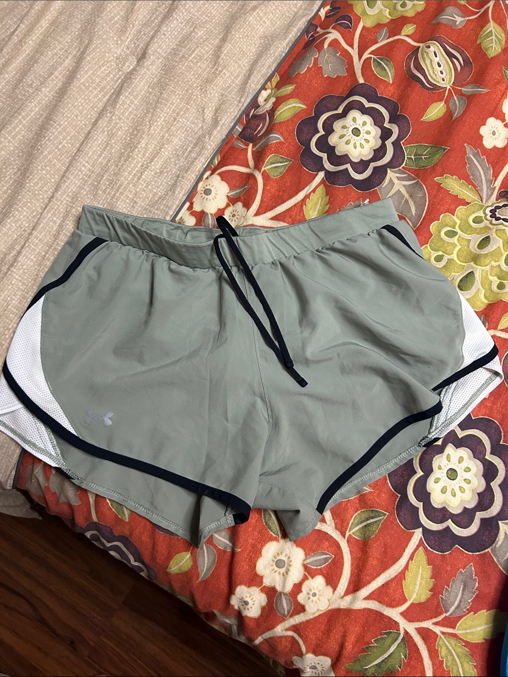 Under Armour Women's Sage Green Athletic Shorts with Black Trim
